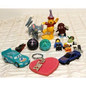 Miscellaneous Bag of Toys -12 Pooh Bear Lightning McQueen Light Saber Mr Raisin